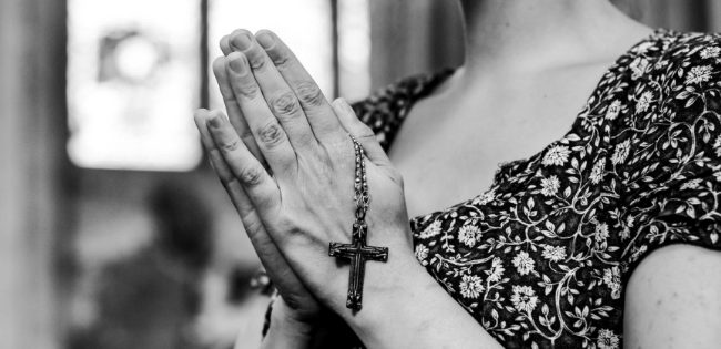 A filipino christian praying