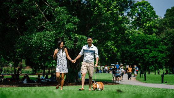 A filipino couple walking together in the park