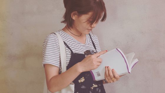 A filipino girl reading a book