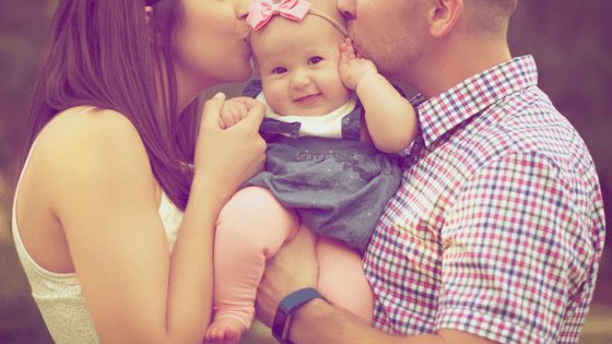 A couple with their cute baby